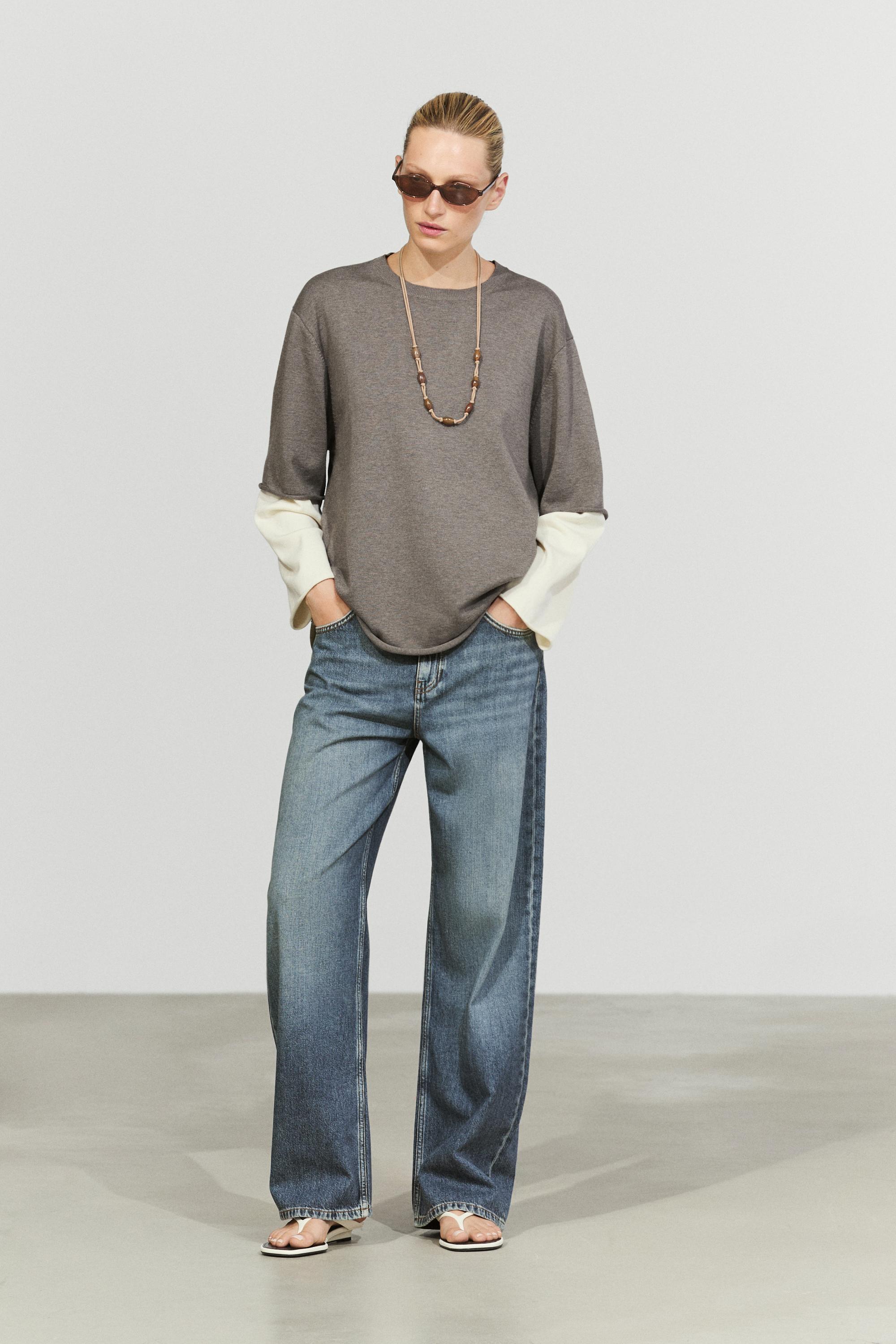 Oversize knit sweater with double sleeve detail